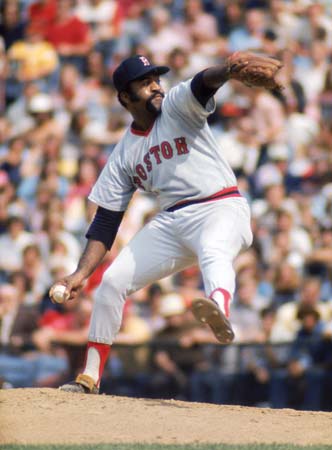 Louis Tiant on the mound in a Red Sox uniform in Fenway Park