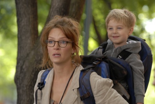 Uma Thurman carries a baby boy in Motherhood