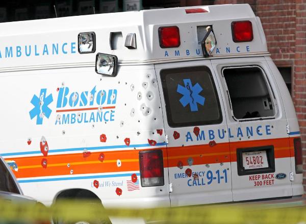 Bullet riddles Boston ambulance - I hope nobody got hurt - somebody call 911